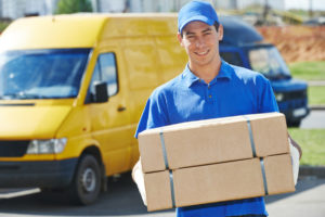 reliable delivery man with two packages